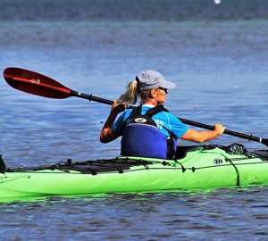 Kayak St. Simons Island. a woman paddling a kayak