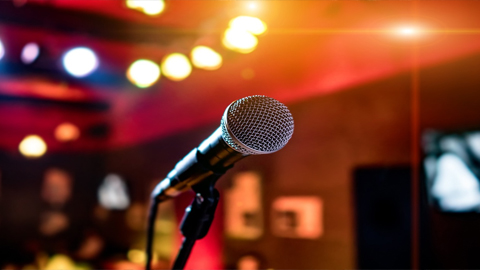Enjoy Bar Trivia, Karaoke and Bingo on St. Simons Island. a microphone