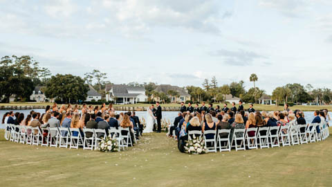 Sea Palms Weddings. an outdoor wedding on a lawn